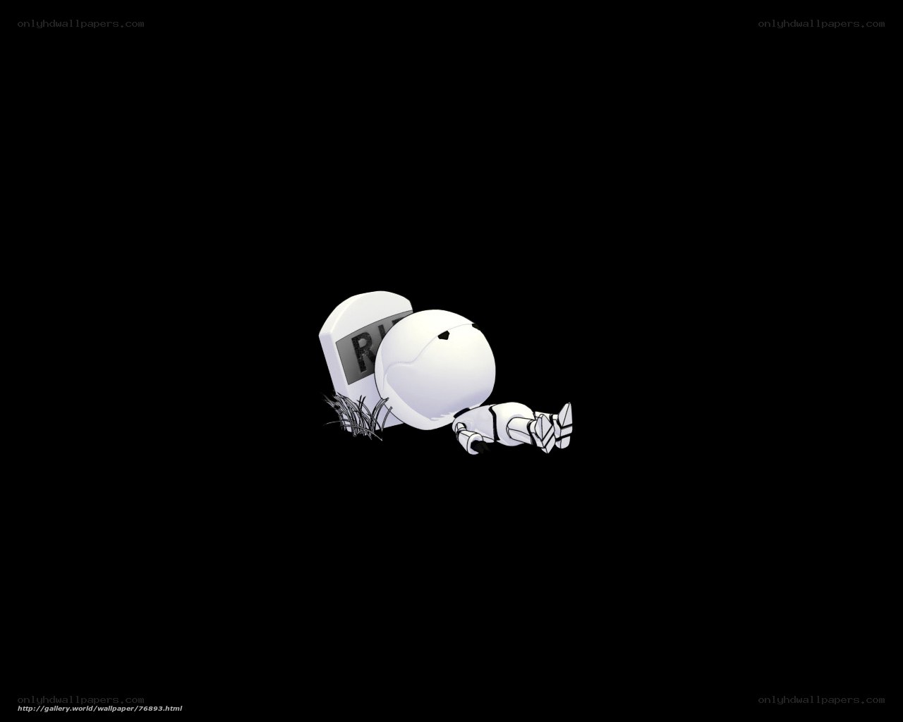Robot lying next to a tombstone