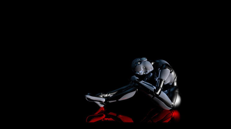robot sitting in darkness
