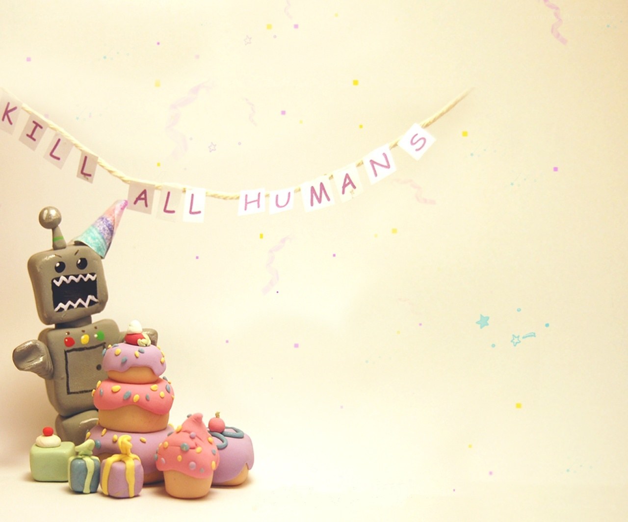 Robot with cupcakes and banner