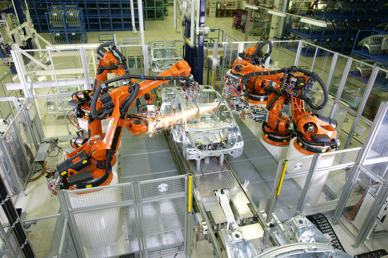 Robotic Arms Welding Car Frames
