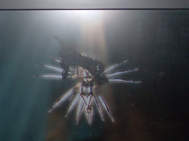 robotic creature in dark water