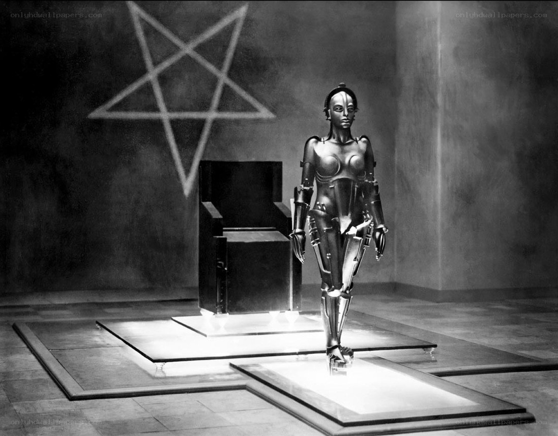 robotic figure in dark chamber