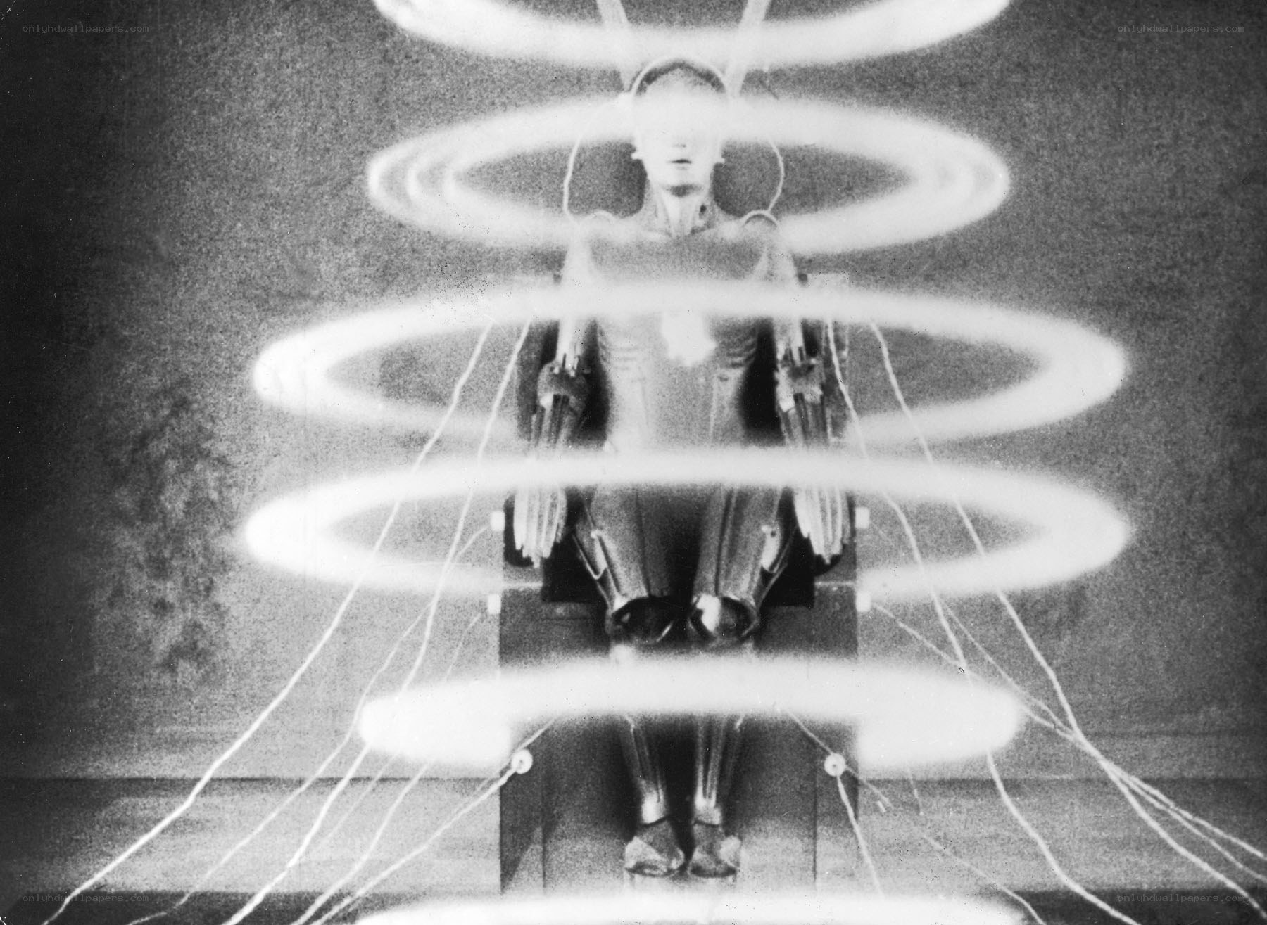 robotic figure with energy rings