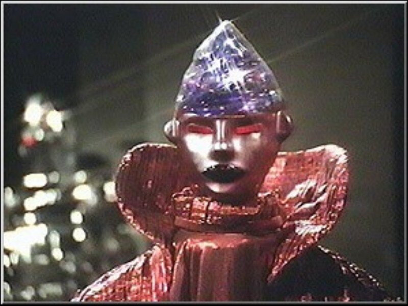 Robotic Figure with Glowing Eyes — Purple