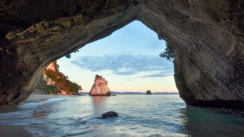 Rock Arch at Beach — Blue, Serene, Sunset, Photograph