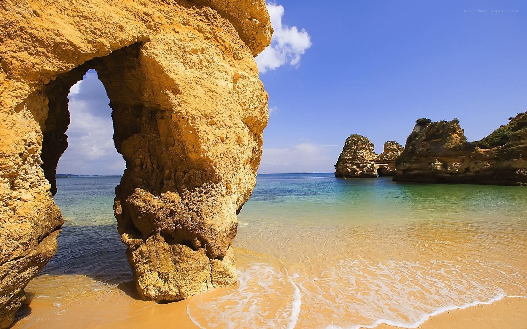 Rock arch at coastal beach