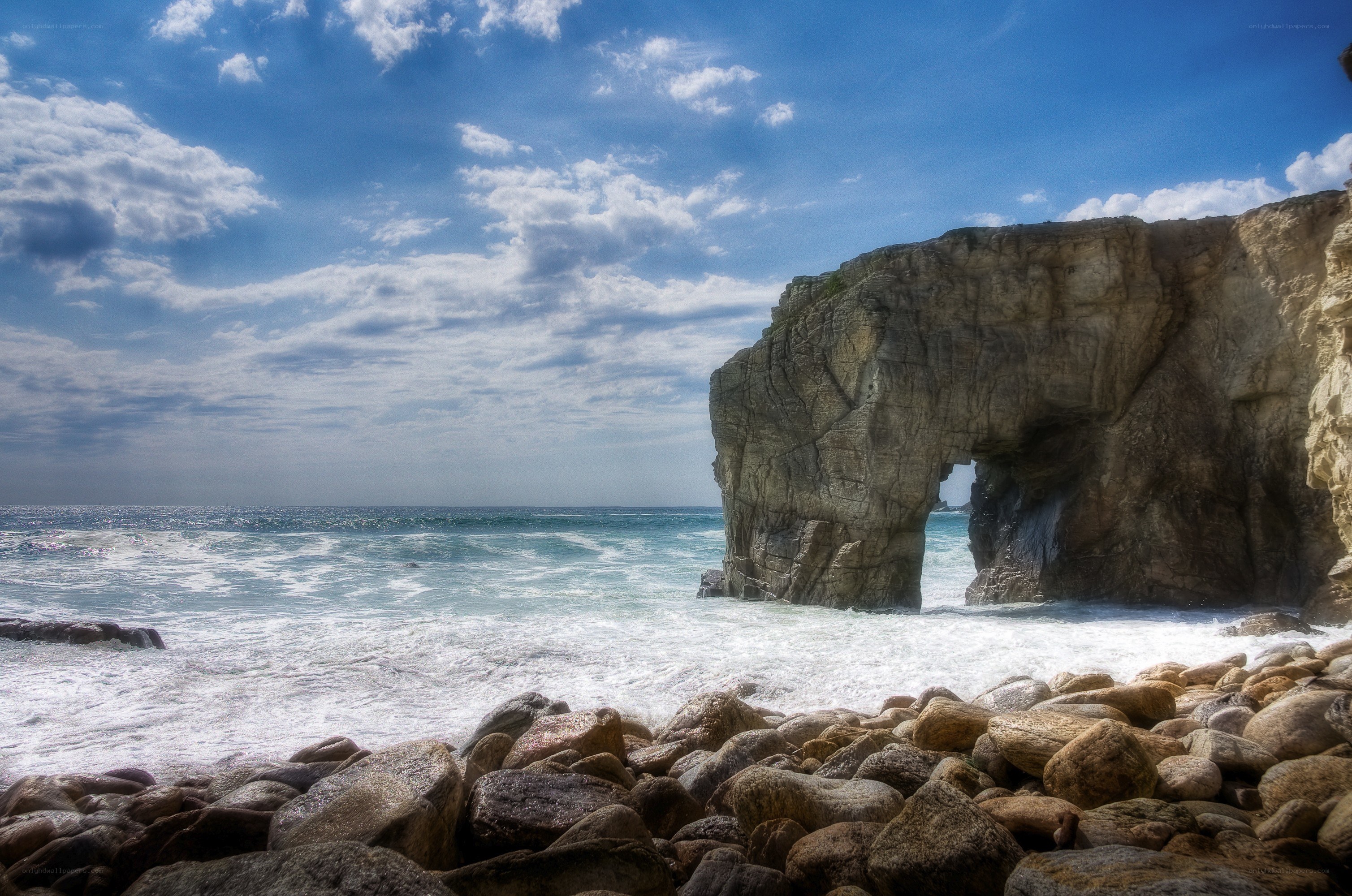 Rock arch at coastal beach