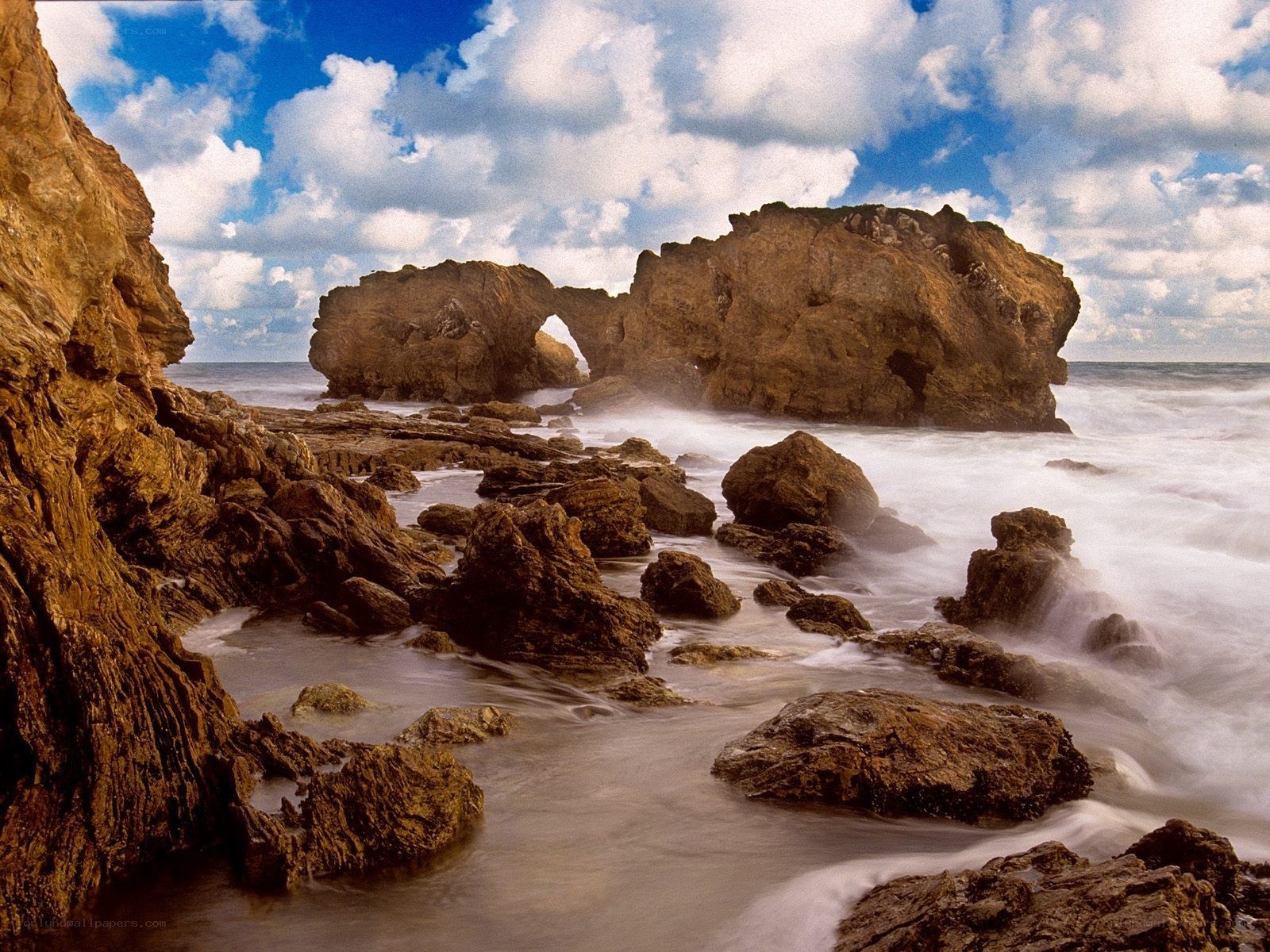 Rock arch at coastal beach