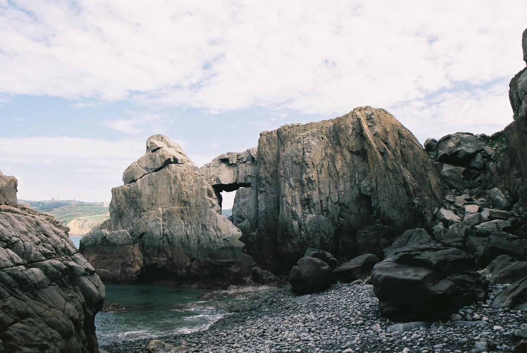rock arch at coastal beach