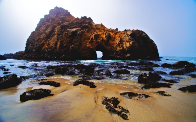 Rock arch at coastal beach