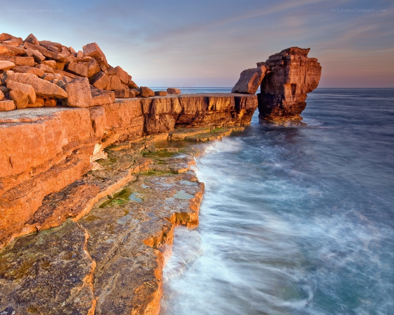 Rock arch at coastal cliff