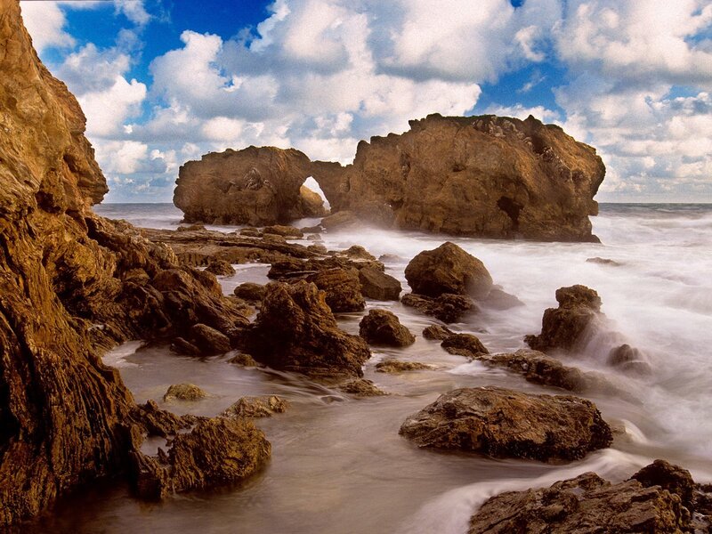Rock arch at coastal shoreline