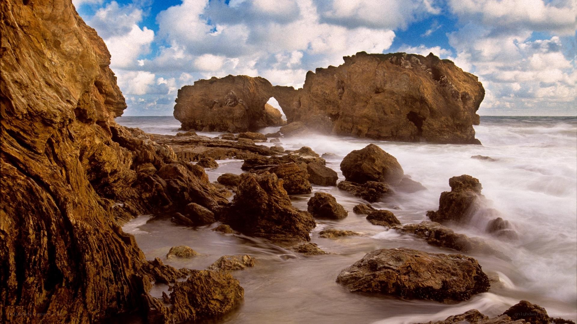 Rock arch at coastal shoreline