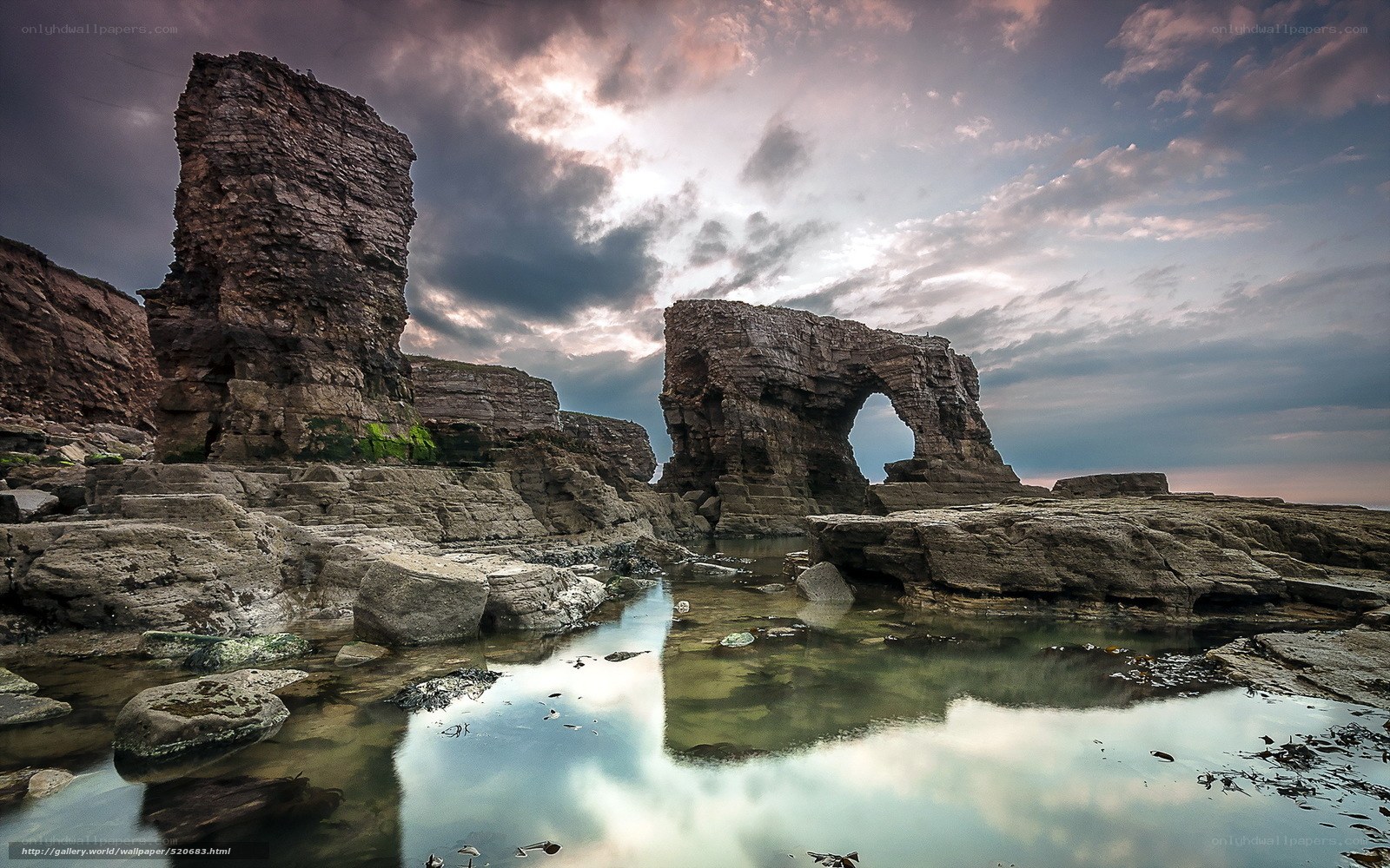 Rock arch at coastal tide pool