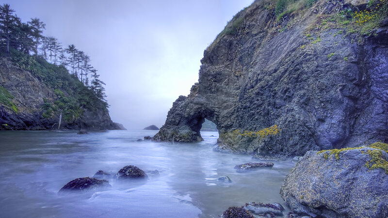 Rock Arch at Coastline — Blue, Misty