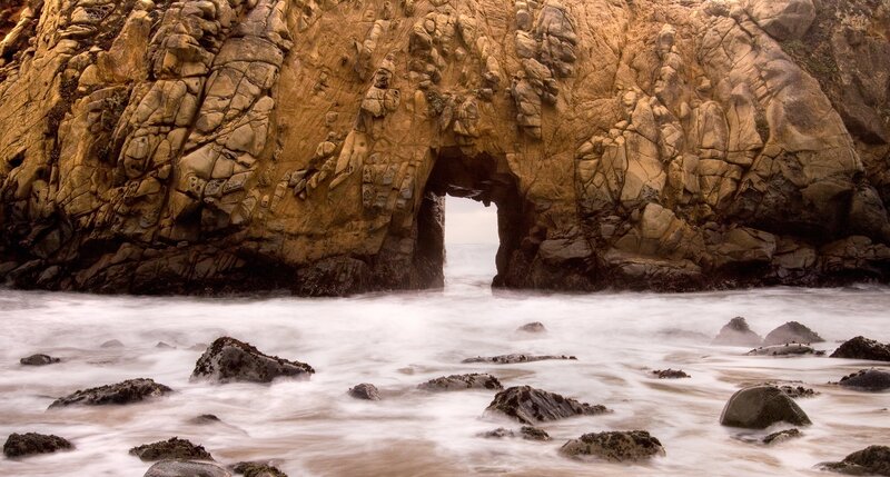 Rock Arch at Coastline — Brown, Serene