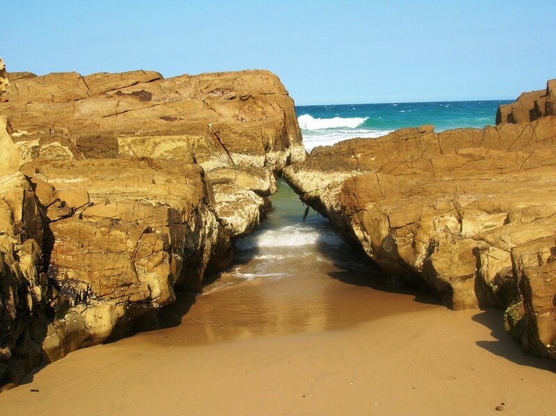 rock arch at sandy beach