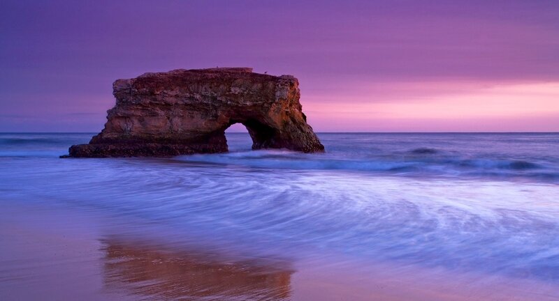 Rock arch at sunset