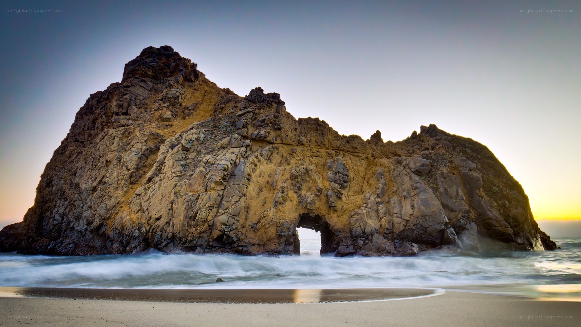 Rock arch at sunset