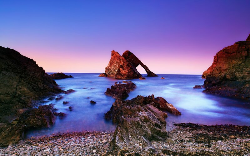 Rock arch at sunset