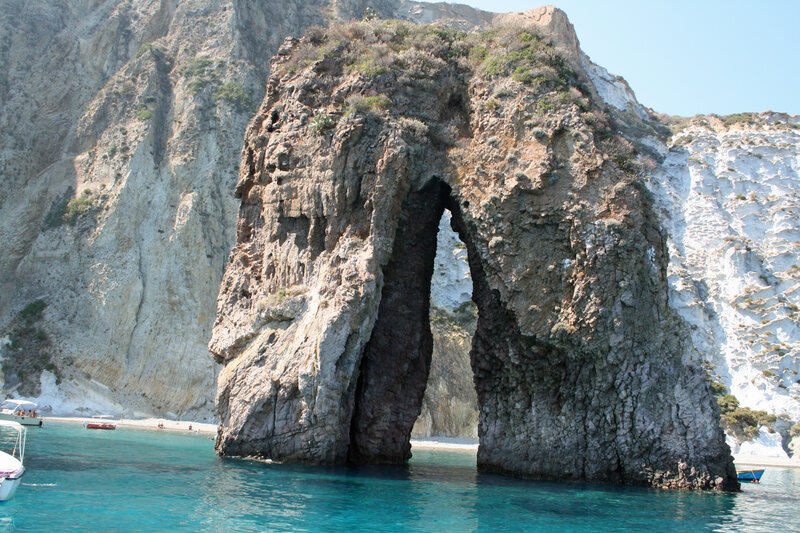 Rock Arch Formation — Blue, Serene, Afternoon, Photograph, Cliffs
