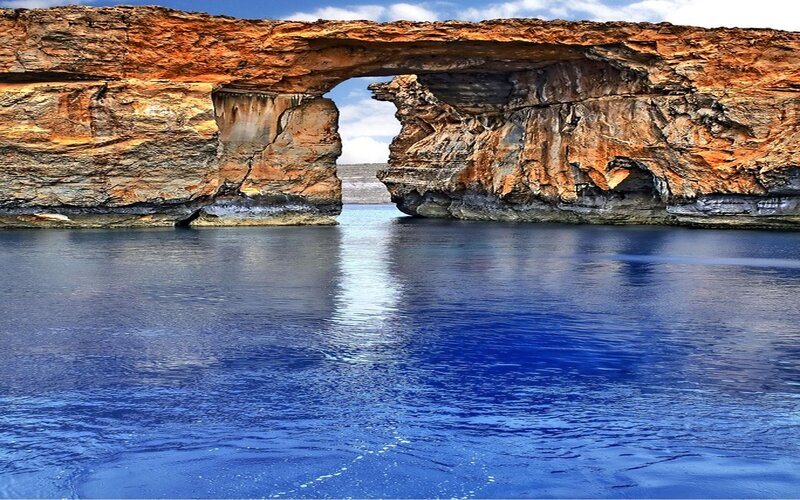 Rock Arch Formation — Blue, Serene, Afternoon, Photograph, Sea, Sky