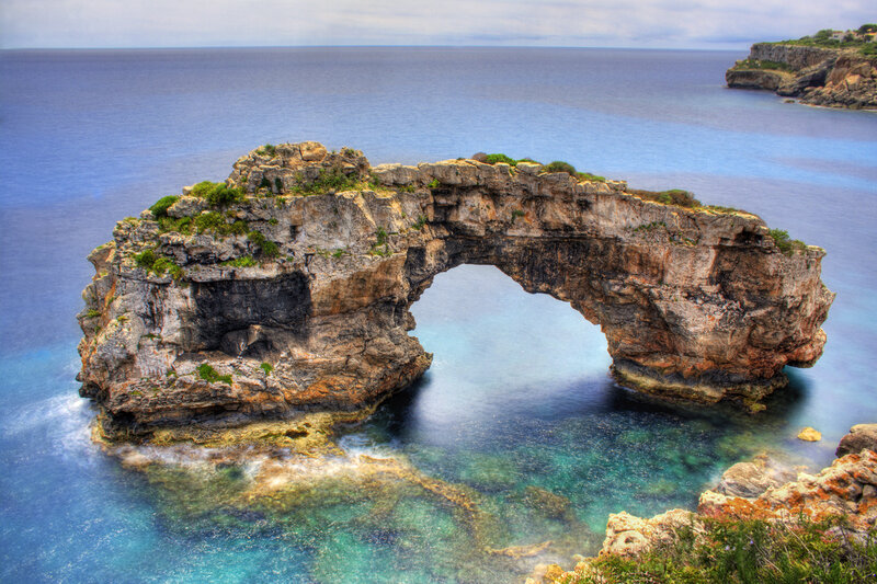 Rock Arch Formation — Blue, Serene, Afternoon, Photograph