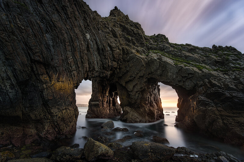 Rock Arch Formation — Gray, Dramatic, Sunset