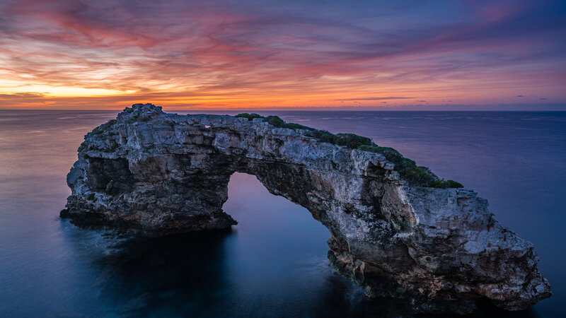 Rock Arch Formation — Purple, Dramatic