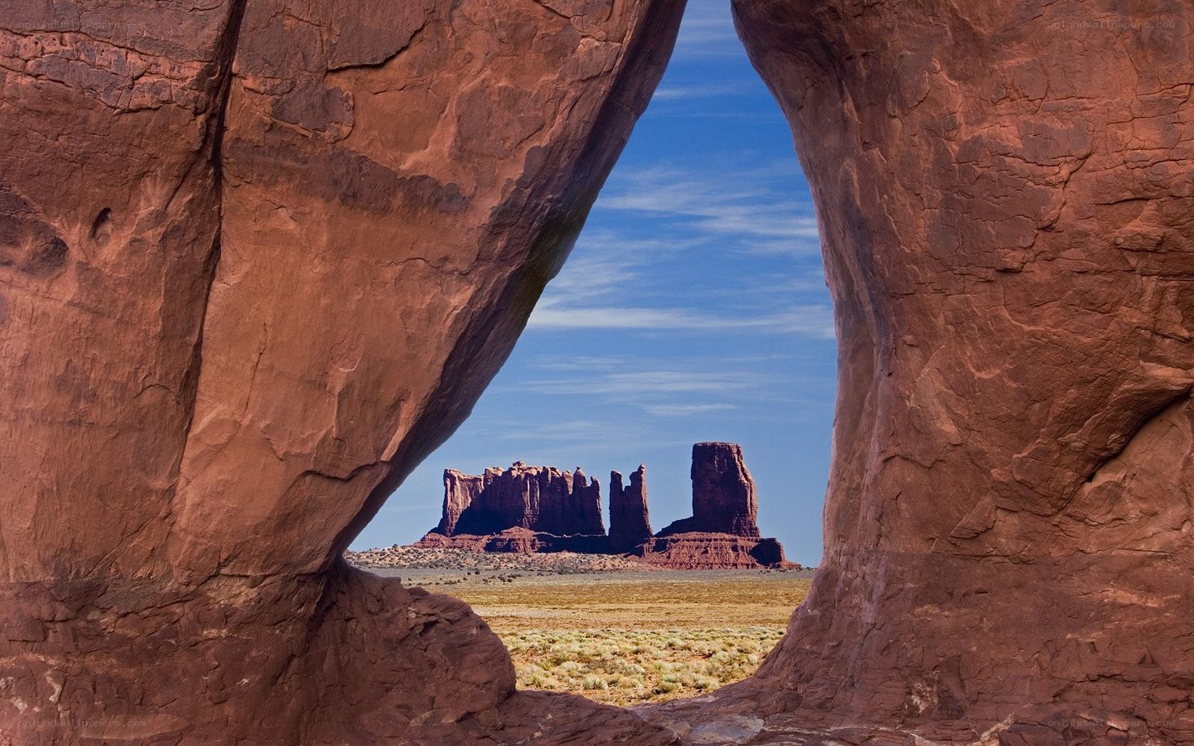 rock arch framing buttes