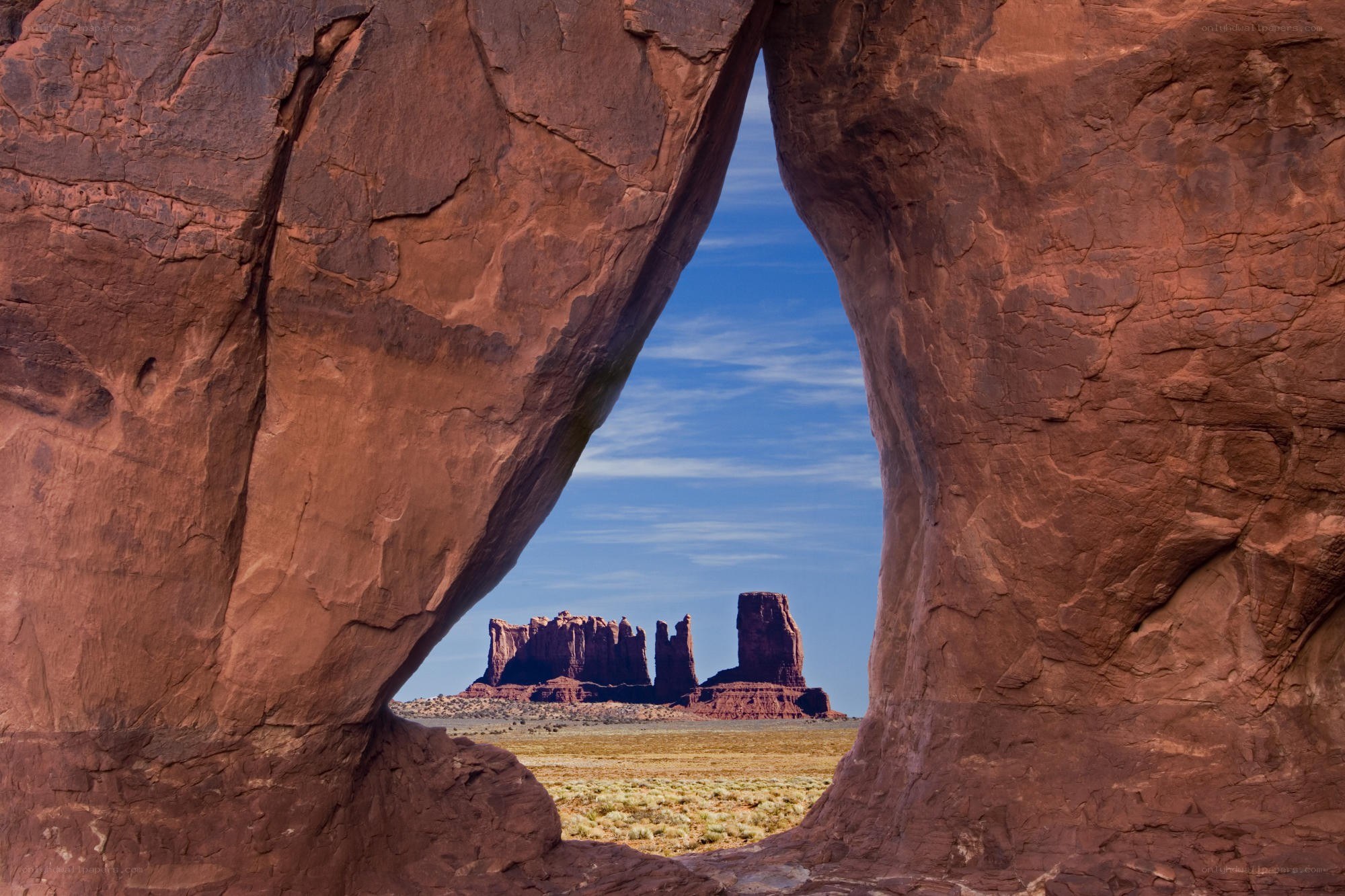 rock arch framing buttes