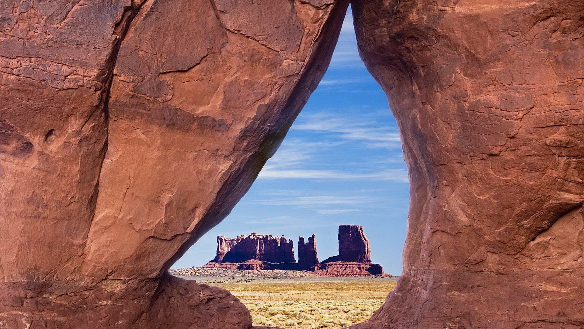 rock arch framing buttes