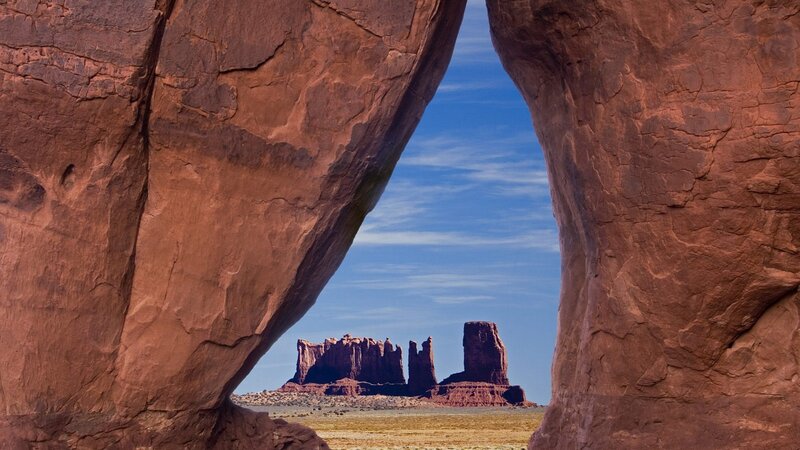 rock arch framing buttes