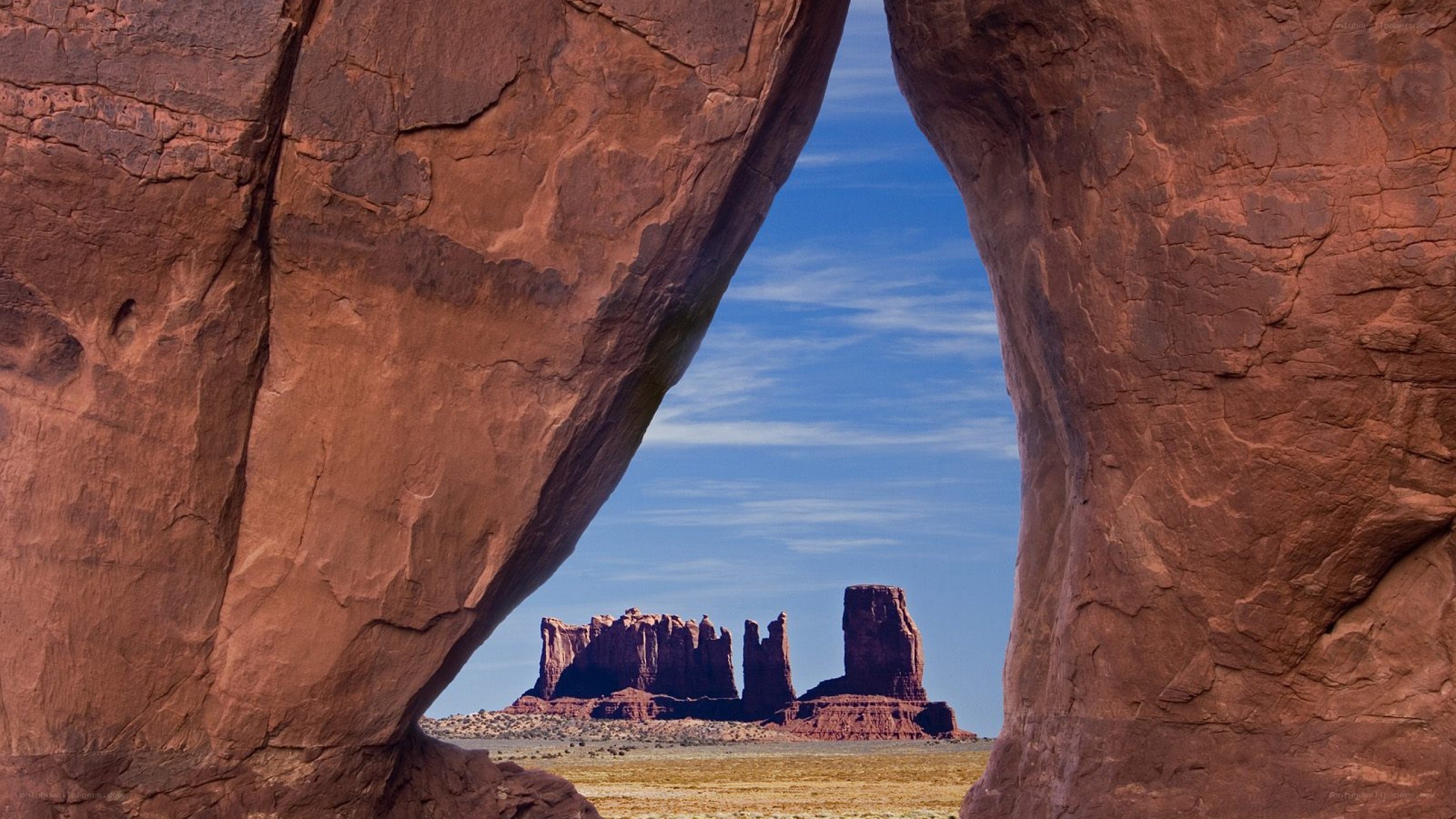 rock arch framing buttes