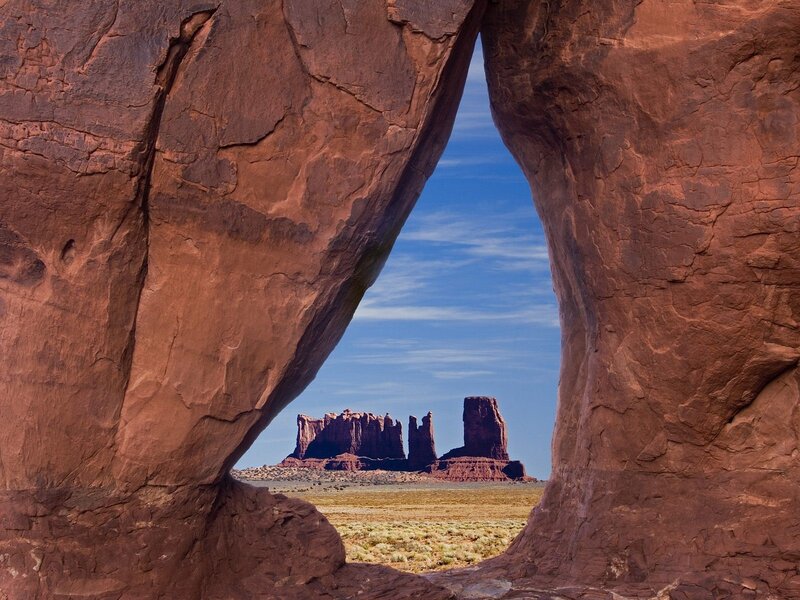 rock arch framing buttes