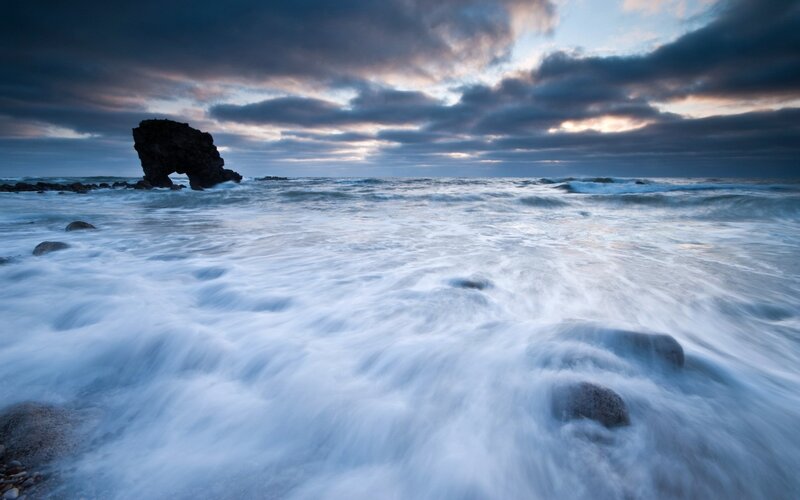 Rock Arch in Ocean — Blue, Dramatic, Sunset, Photograph