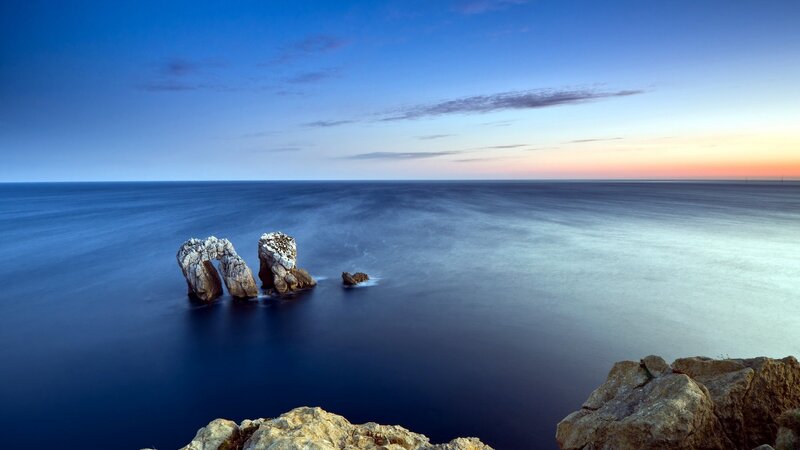 Rock Arch in Ocean — Blue, Serene, Sunset, Photograph