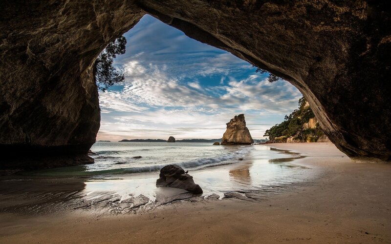 Rock Arch on Beach — Brown
