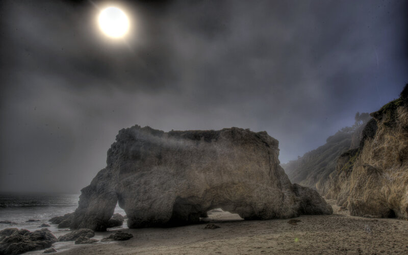 Rock Arch on Beach — Gray