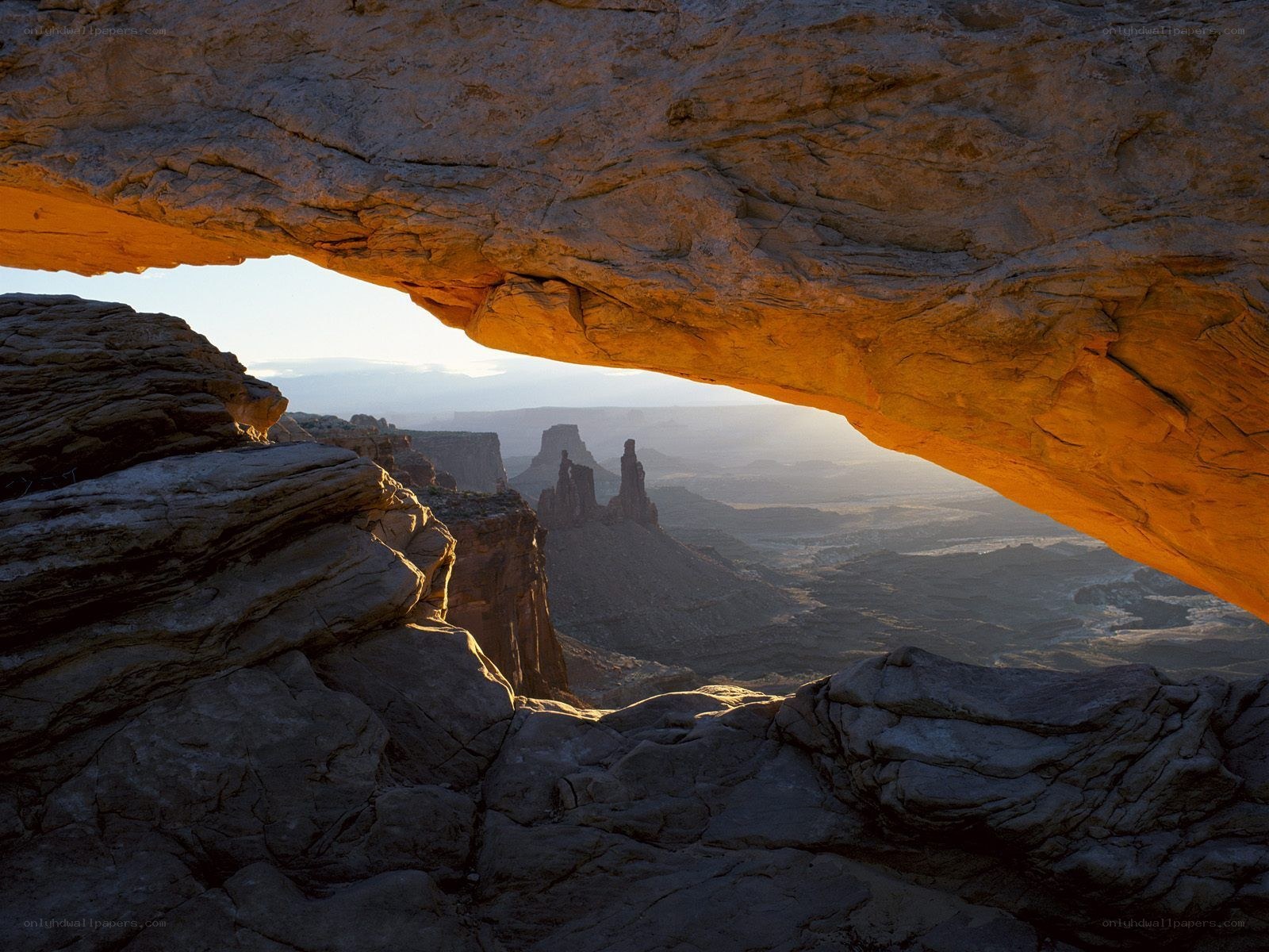 rock arch overlooks canyon