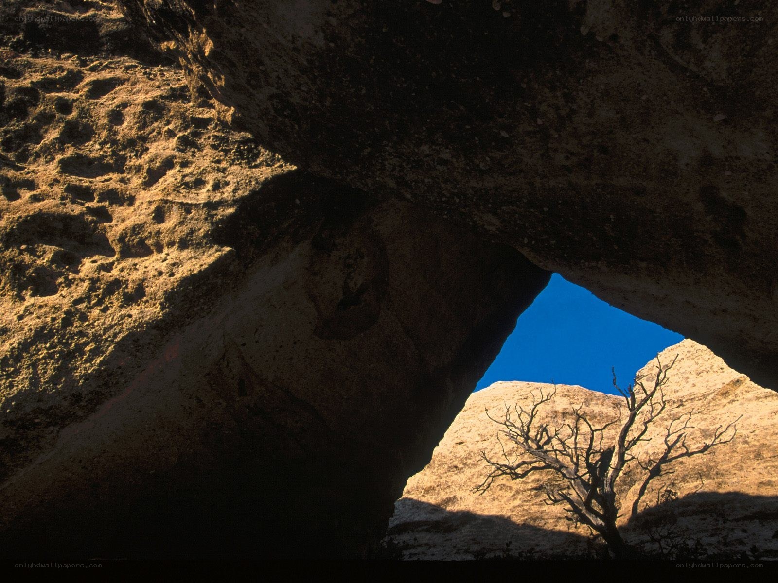 rock arch with blue sky view