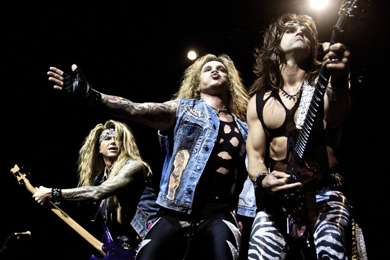 Rock Band Performing on Stage — Black, Energetic