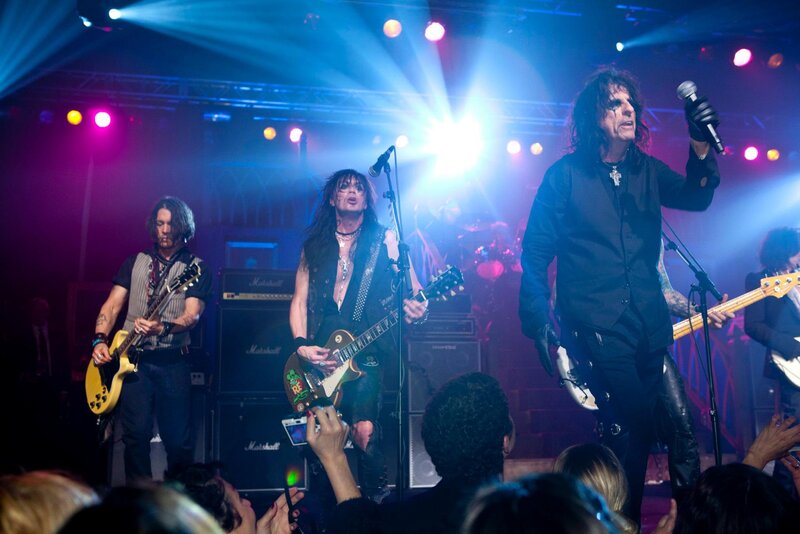 Rock Band Performing on Stage — Blue