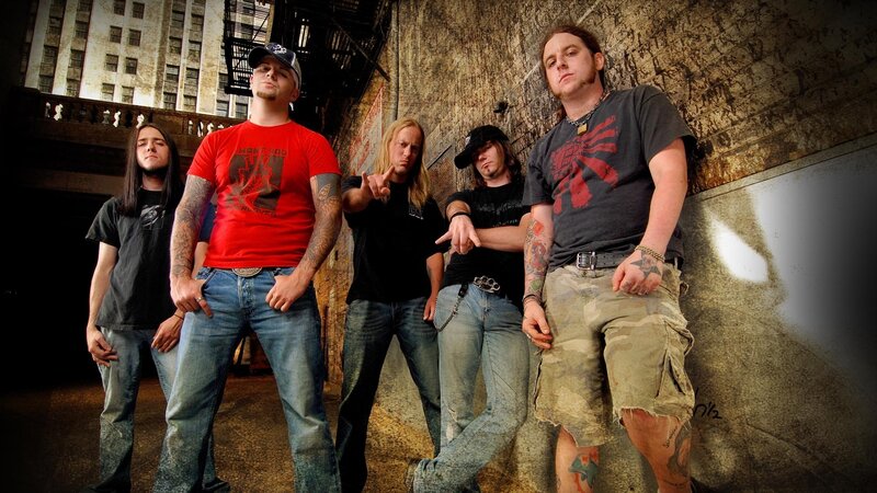 rock band posing in alley