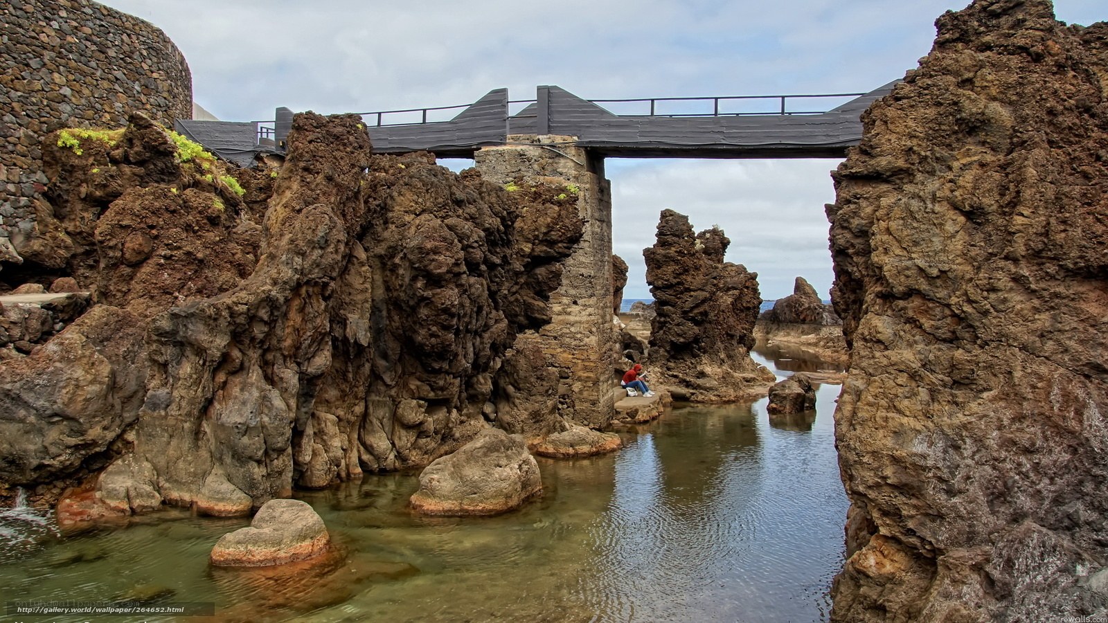 rock bridge over water channel