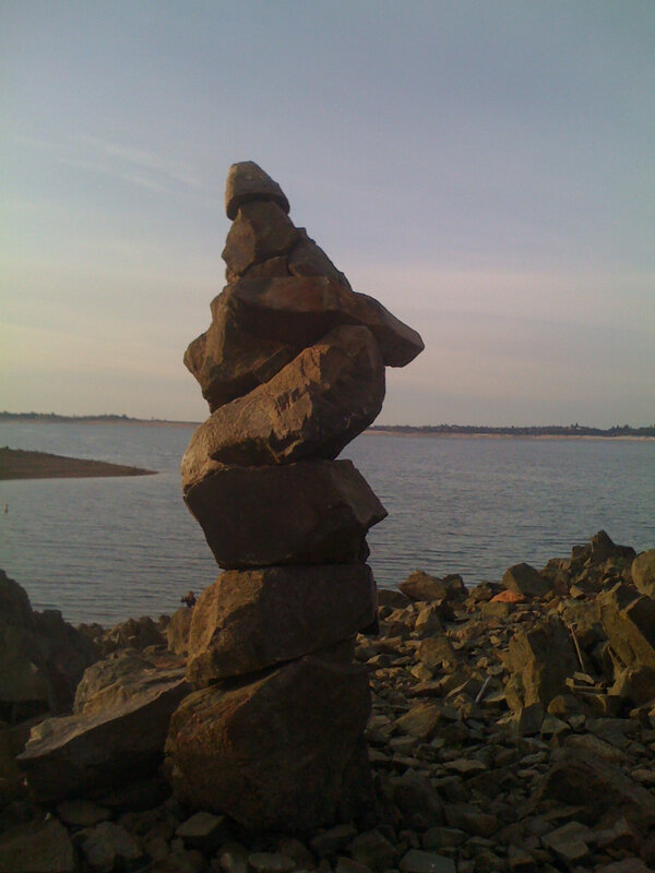 Rock cairn by the water