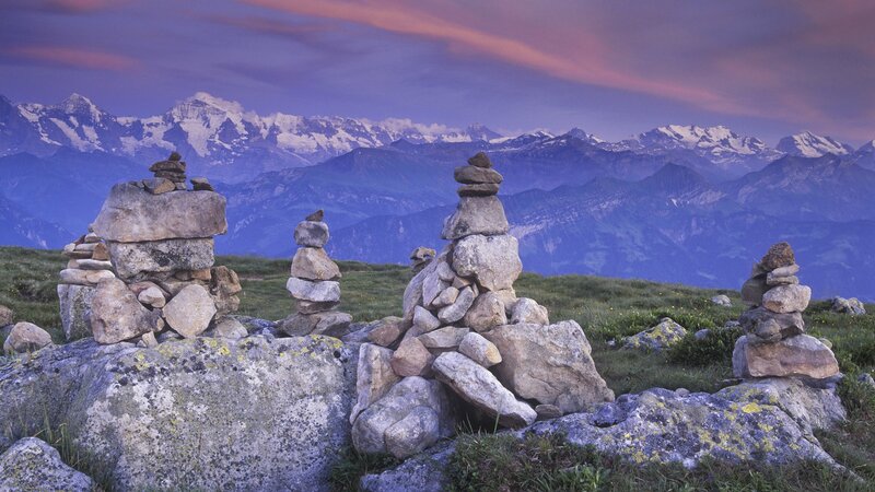 Rock Cairns in Mountains — Purple