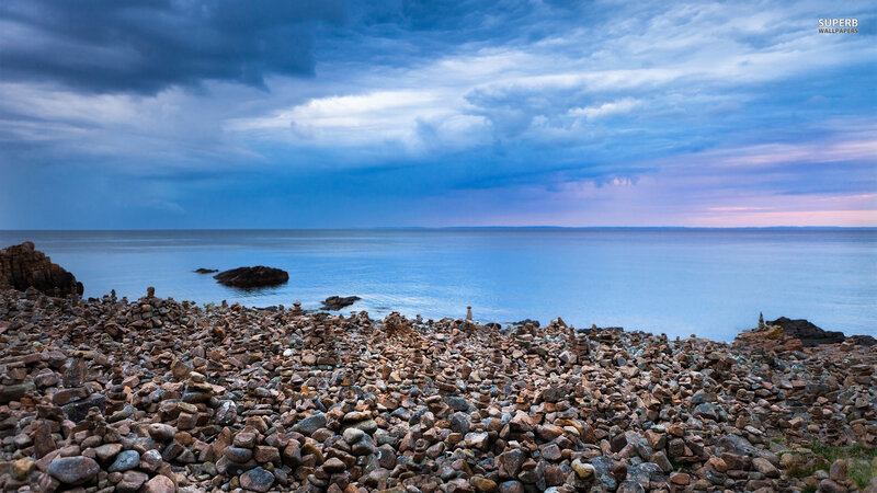 Rock Cairns on Beach — Blue