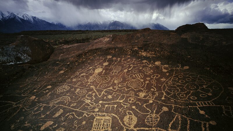 Rock Carvings on Hillside — Brown