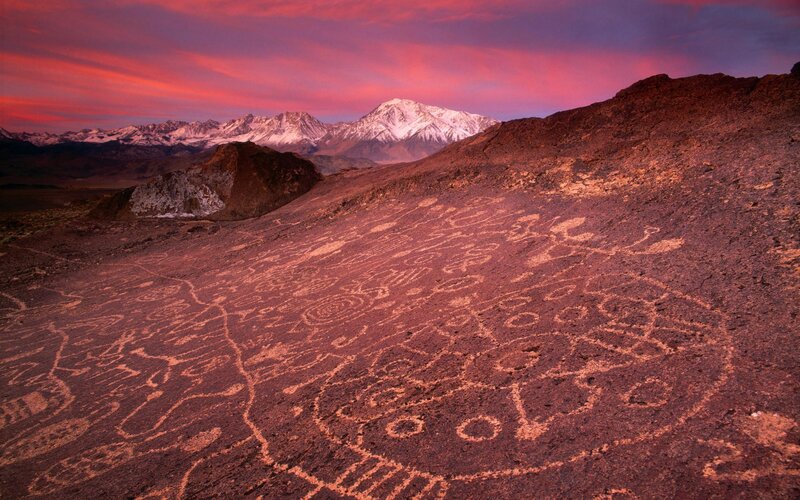Rock Carvings on Hillside — Red, Dramatic, Sunset, Photograph